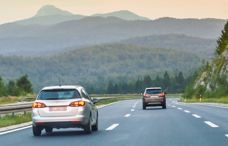cars driving down the highway