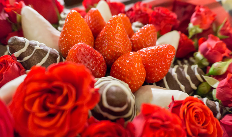 fruit bouquet with chocolates and flowers