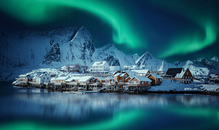 northern lights above village