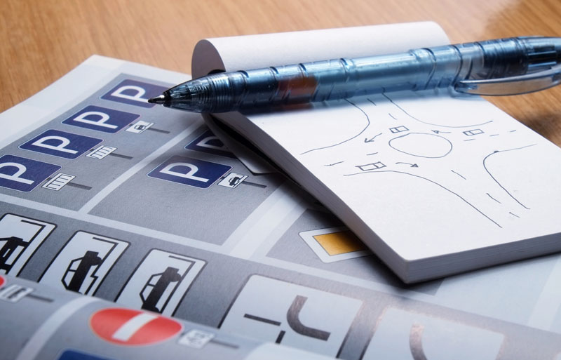 notepad containing driving instruction notes