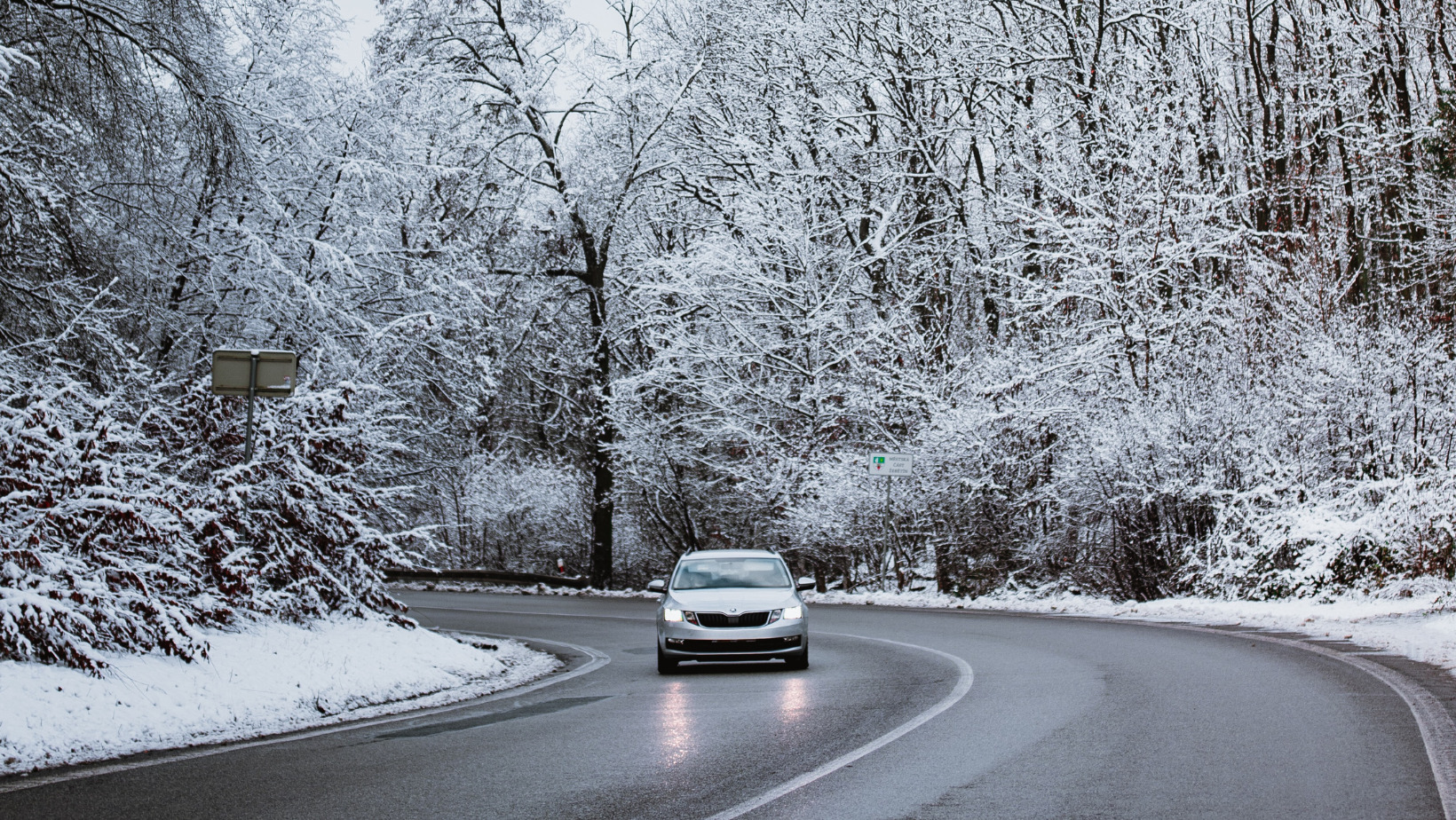 Car driving on a snowy road