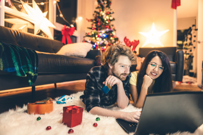 couple holiday shopping online with identity protection