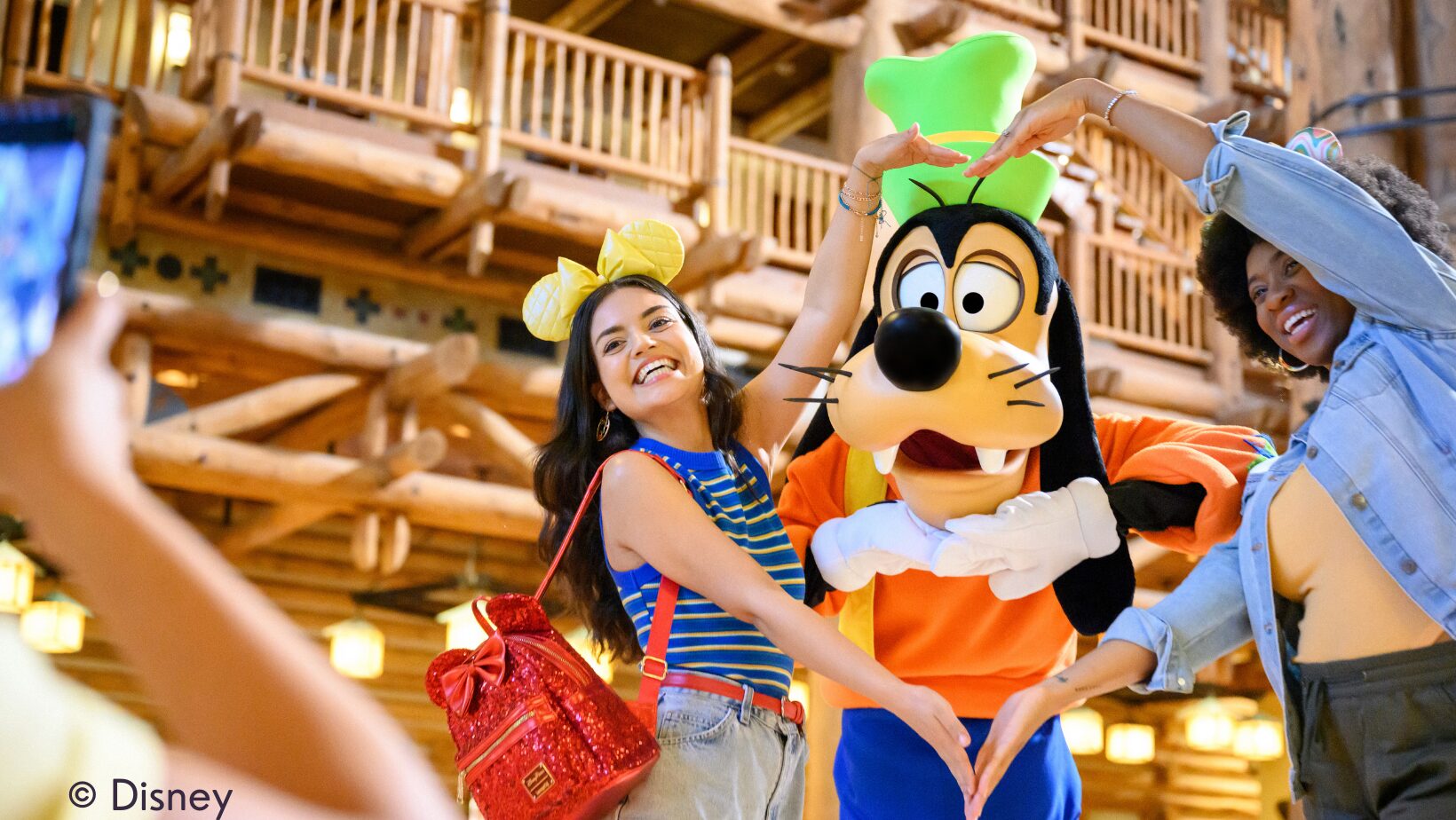 Women at Wilderness Lodge in Walt Disney World with Goofy
