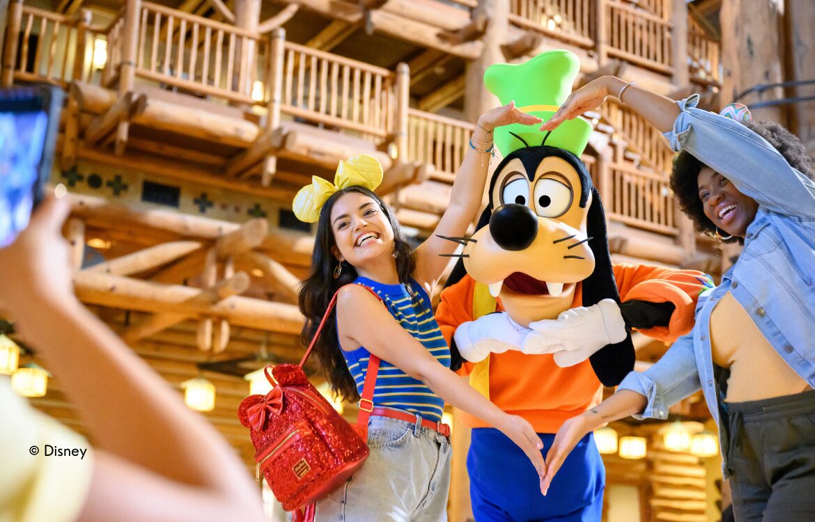 Ladies at Wilderness Lodge with Goofy in Disney World
